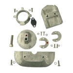 Metal engine parts with screws and washers.