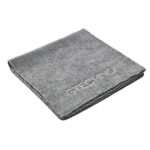 Folded gray microfiber cleaning towel with embossed logo