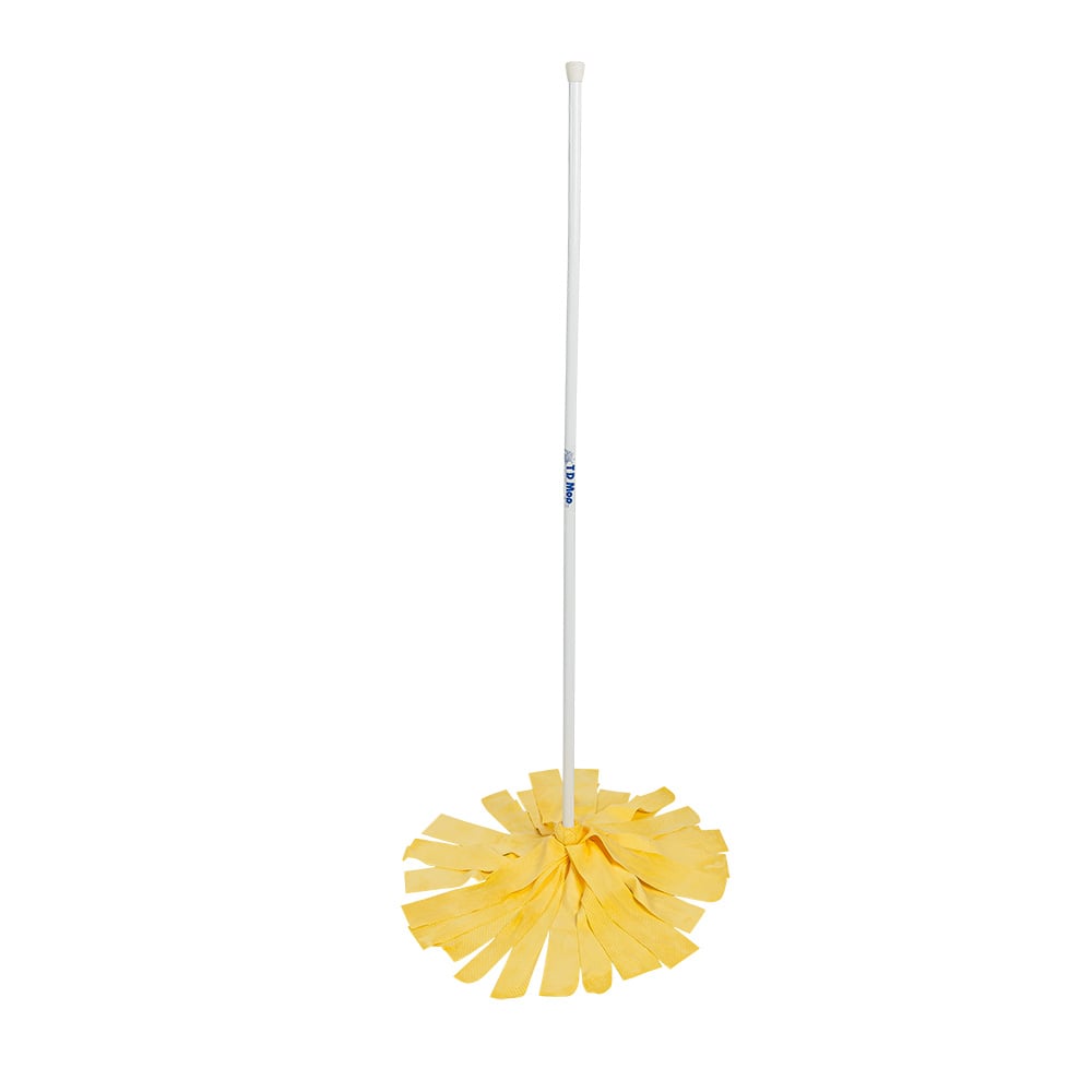 Yellow mop with white handle standing upright.