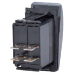 Black rocker switch with four metal terminals