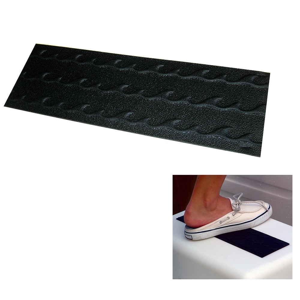 Anti-slip bath mat with foot stepping on it.