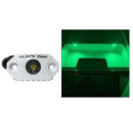 Black Oak LED light illuminating boat compartment green