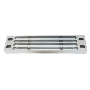 Metal tooling fixture with slots and pegs.