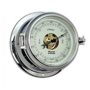 Polished chrome marine barometer with visible gears