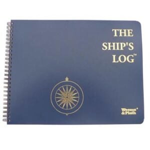 Blue spiral-bound ship's logbook with compass design