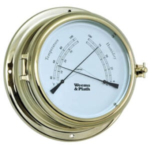 Brass analog barometer with temperature and humidity dials