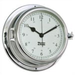 Polished chrome nautical wall clock showing 10:10