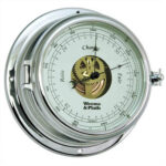 Polished nautical barometer with visible gears and dial