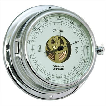 Polished nautical barometer with visible gears and dial