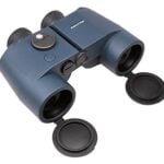 Compact blue binoculars with open lens caps