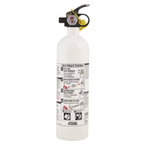 White fire extinguisher with instruction label and gauge